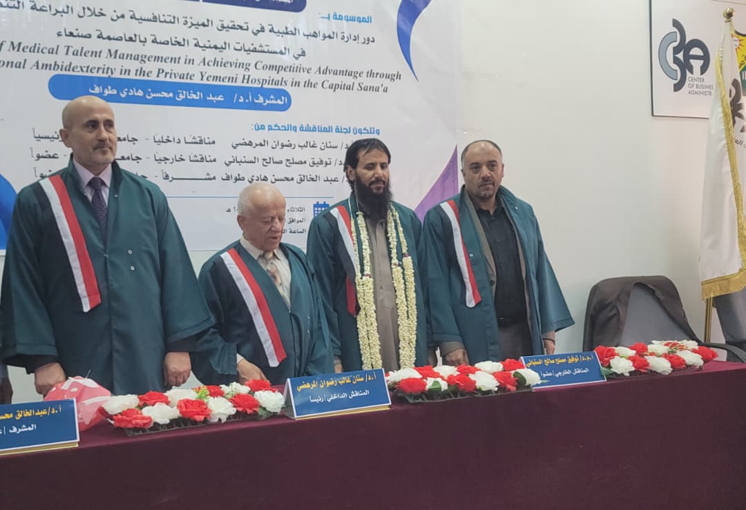 احمد حسن مع اللجنة.jpg
